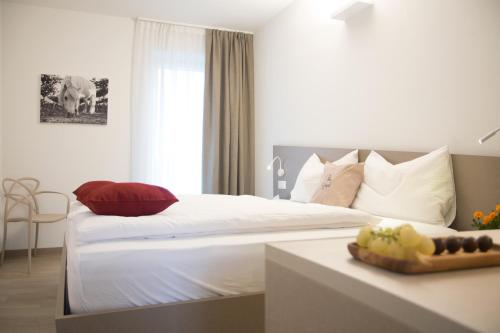 Postel nebo postele na pokoji v ubytování 8 Grappoli Agritur