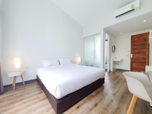 Un ou plusieurs lits dans un hébergement de l'établissement MEET Boutique Resort