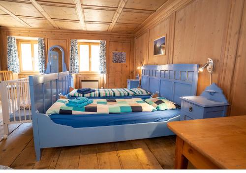 מיטה או מיטות בחדר ב-Chasa Werro
