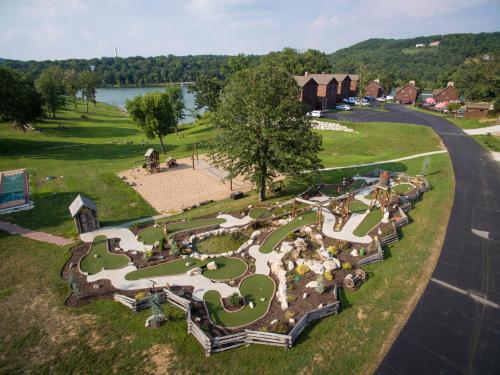 an aerial view of a park with a playground at Chalets Resort Luxury Lakefront Villa Amazing View 2 Pools Free Amenities Dock in Lampe
