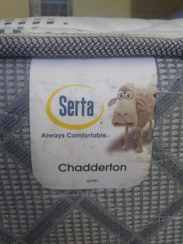 a label with a picture of a sheep on a mattress at The Ohio Motel in Bath