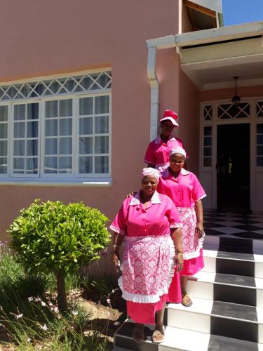 three women standing on the steps of a house at The Fancy Cactus in Colesberg