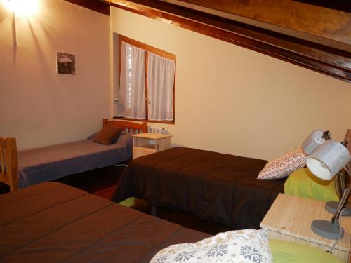 מיטה או מיטות בחדר ב-Ransol - El Tarter