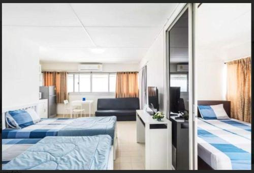 Llit o llits en una habitació de New Room