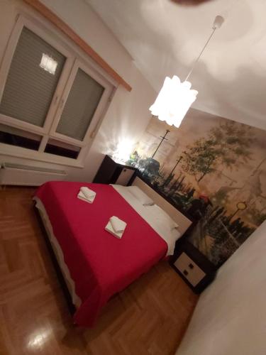 Cama o camas de una habitación en RED Apartment