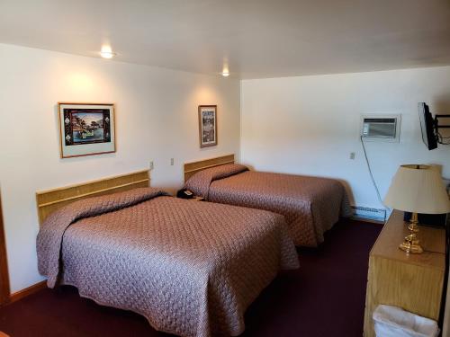 Voodi või voodid majutusasutuse Lake View Motel toas