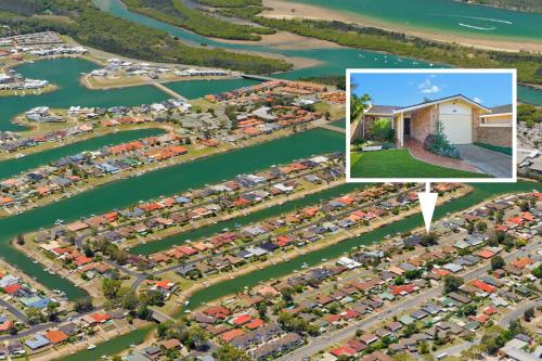 an aerial view of a marina with a building at 29A Ballina Crescent Port Macquarie in Port Macquarie