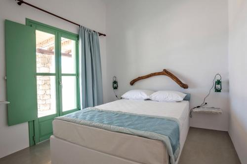 Katil atau katil-katil dalam bilik di Ailouros Scenic Guest Houses