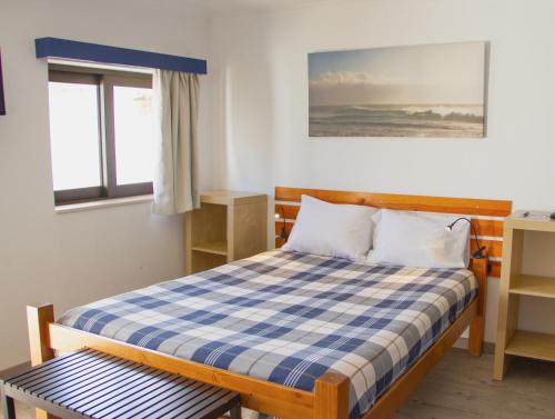 
Uma cama ou camas num quarto em PenichePraia - Bungalows, Campers & SPA
