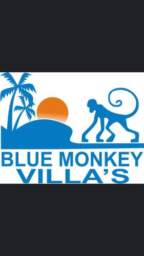 a blue monkey riding a wave on a surfboard at Blue Monkey Retreat Areguling Lombok in Kuta Lombok