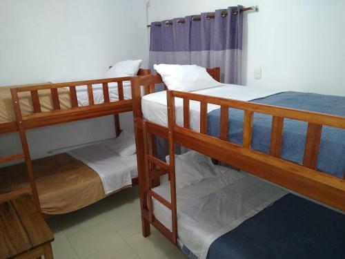 Двуетажно легло или двуетажни легла в стая в BACHÍG Hospedaje