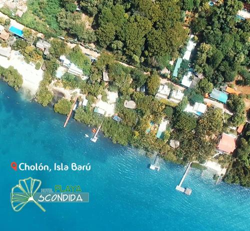 an aerial view of a small island in the water at Hotel Playa Scondida Barú in Baru