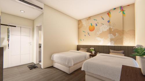 Ένα ή περισσότερα κρεβάτια σε δωμάτιο στο Hotel 88 Alun Alun Bandung By WH
