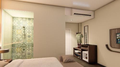 Ένα ή περισσότερα κρεβάτια σε δωμάτιο στο Hotel 88 Alun Alun Bandung By WH