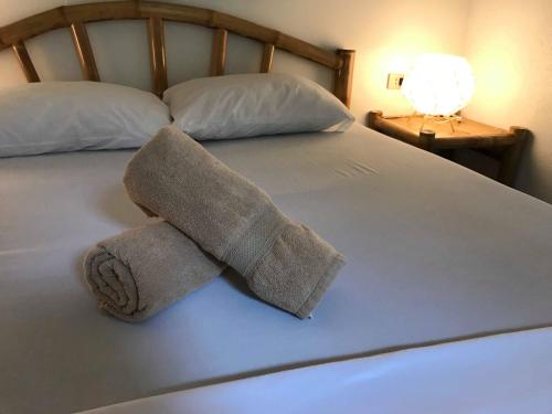 Кровать или кровати в номере Lukay Resort Siargao