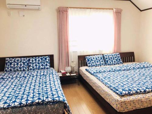 Ένα ή περισσότερα κρεβάτια σε δωμάτιο στο Kaen