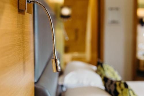 a close up of a light attached to a wall at Crown Spa Hotel Scarborough by Compass Hospitality in Scarborough