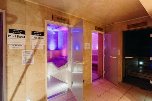 a elevator in a room with purple and purple lights at Crown Spa Hotel Scarborough by Compass Hospitality in Scarborough