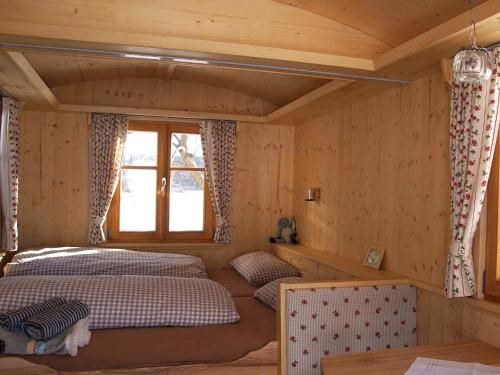 Katil atau katil-katil dalam bilik di Berghof