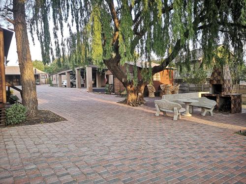 Gallery image of The Log Cabin Apartments Hotel in Standerton