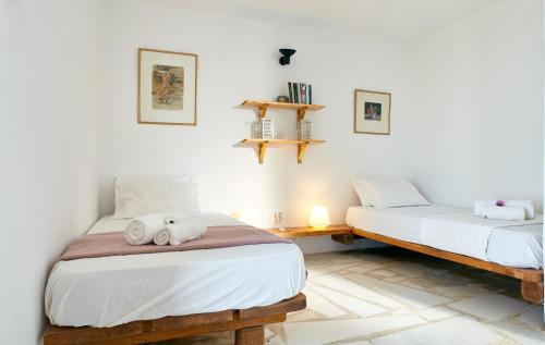 Katil atau katil-katil dalam bilik di The Pool Garden House with a fantastic sea and sunset view