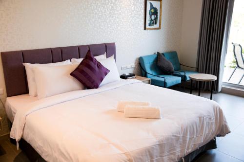 Cama o camas de una habitación en 墾丁椰林 海灘文旅