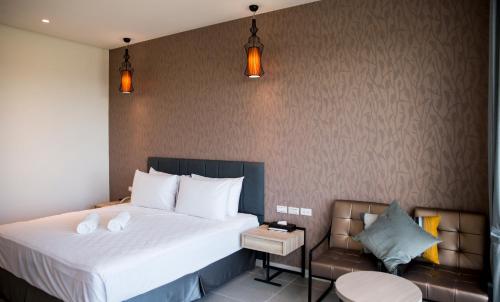 Cama o camas de una habitación en 墾丁椰林 海灘文旅