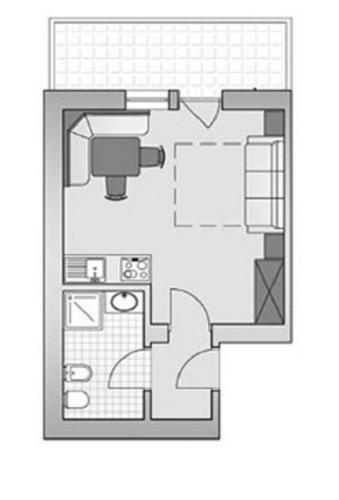 a floor plan of a bathroom with a toilet at Apparthotel Sellaronda in Arabba