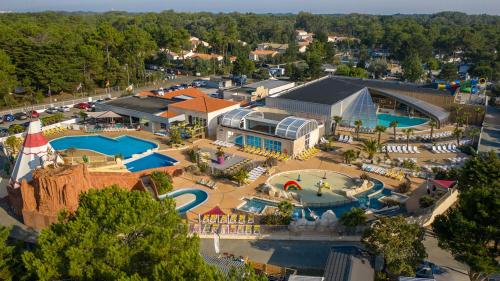 an aerial view of a water park at a resort at Camping Les Genêts in Saint-Jean-de-Monts