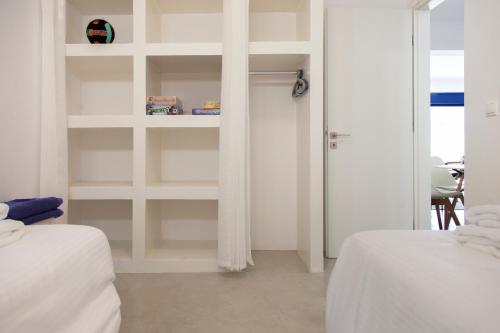 Ένα ή περισσότερα κρεβάτια σε δωμάτιο στο Galini Villas