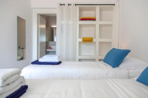 Ένα ή περισσότερα κρεβάτια σε δωμάτιο στο Galini Villas