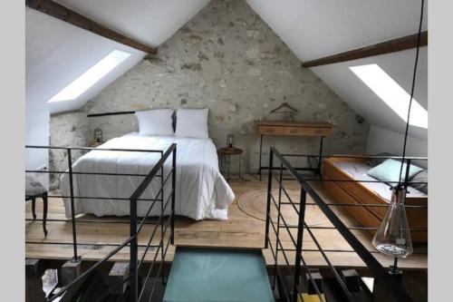 Postel nebo postele na pokoji v ubytování Le gite de l'auge