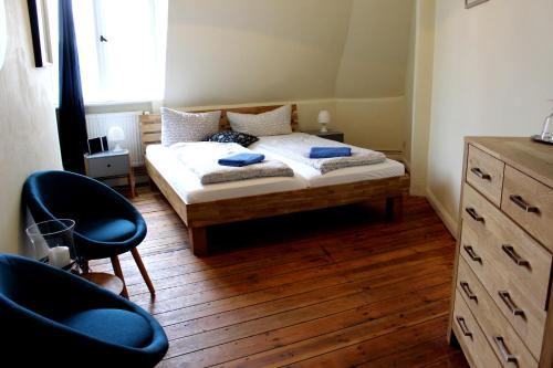 En eller flere senge i et værelse på The Avalon Hotel
