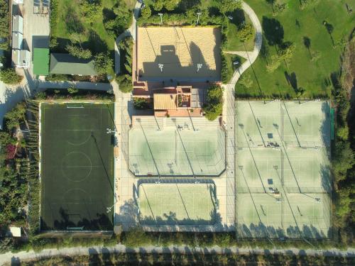 an overhead view of a house with three roofs at ROBINSON QUINTA DA RIA - All Inclusive in Vila Nova de Cacela