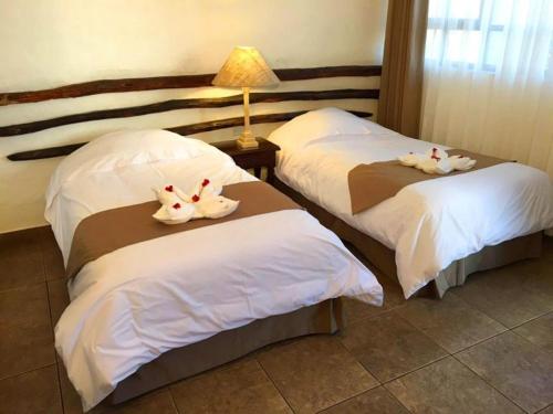 Ένα ή περισσότερα κρεβάτια σε δωμάτιο στο Hotel Sol de Ica