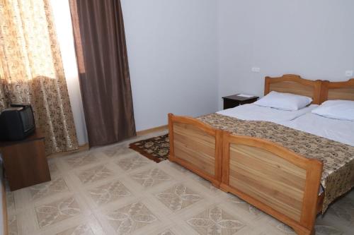 Ένα ή περισσότερα κρεβάτια σε δωμάτιο στο Cottages in Vanadzor