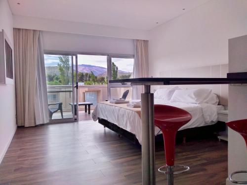 Ένα ή περισσότερα κρεβάτια σε δωμάτιο στο Hotel Cantera Respira Campo