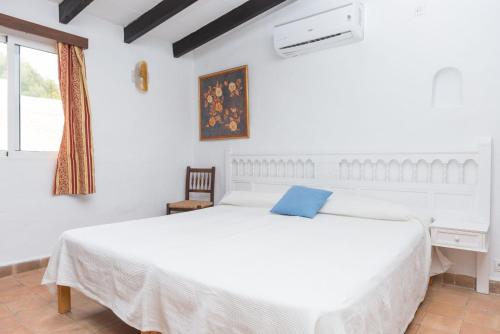 A bed or beds in a room at Cala Serena Beach 6