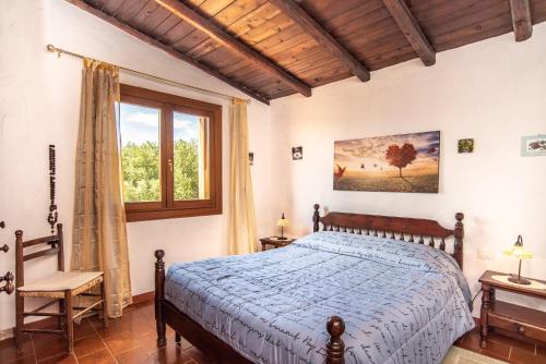 Ένα ή περισσότερα κρεβάτια σε δωμάτιο στο Splendida Vista su Tavolara