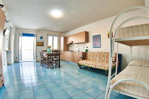 Ένα ή περισσότερα κρεβάτια σε δωμάτιο στο Residence La Perla - Smeraldo