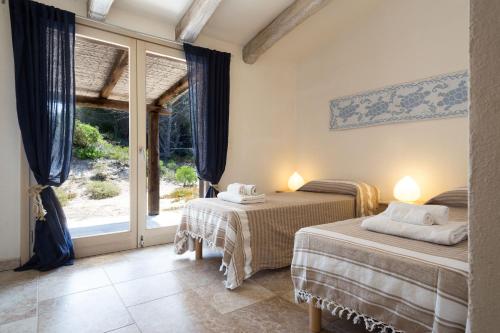 Villa I Graniti 객실 침대