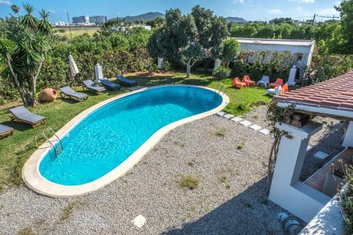 Utsikt över poolen vid Casa Mamita Ibiza eller i närheten