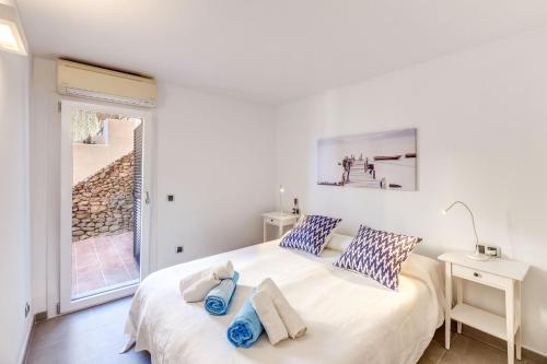 A bed or beds in a room at Apartamento Mirador