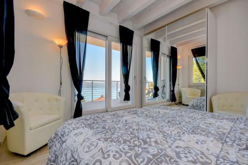 Ένα ή περισσότερα κρεβάτια σε δωμάτιο στο Appartamento Luxury 2