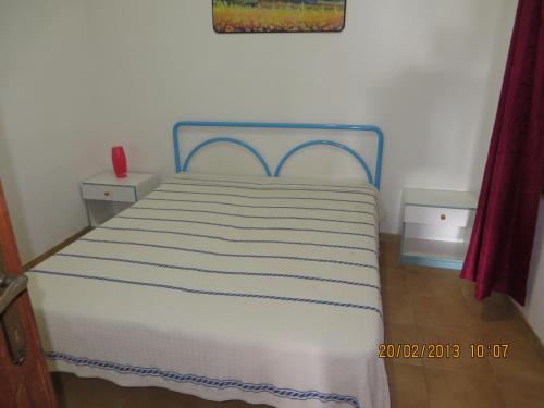 Postel nebo postele na pokoji v ubytování Accu is Prezzus cod G dal mare 30mt