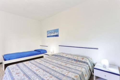 PalazzoにあるAppartamento Innamorata 2のベッドルーム1室(ベッド2台付)