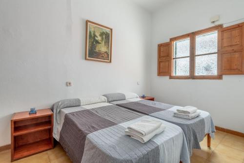 Postel nebo postele na pokoji v ubytování Nafeti