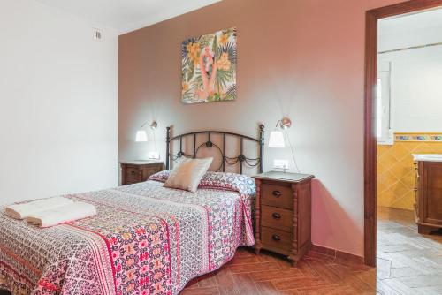 Posteľ alebo postele v izbe v ubytovaní Casa Familiar La Lobita 1