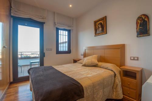 Postel nebo postele na pokoji v ubytování La casa de La Alhambra