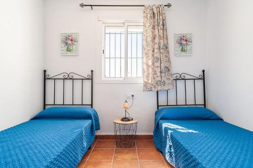 Posteľ alebo postele v izbe v ubytovaní Casa Marquez - Sólo Familias